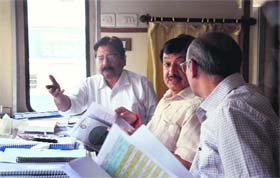 VK Gupta (centre), general manager of Northern Railways, aboard a special train during his stoppage at the railway station in Ludhiana on Tuesday