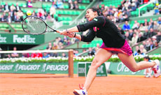Marion Bartoli beat Olga Govortsova 7-6, 4-6, 7-5 on Tuesday.  AFP 