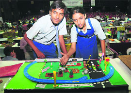 Students of Tribune Model School show their project at an exhibition in Chandigarh on Wednesday. 