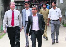 CMs political secretary Tanvir Sadiq with Canadian diplomat David Hamilton in Srinagar on Wednesday