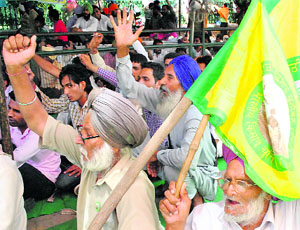 BKU activists join a protest rally by the PSEB Techincal Service Union in Patiala on Wednesday. 