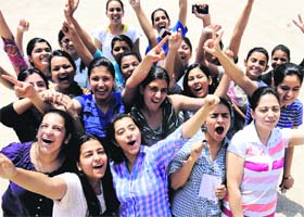 Girls in a jubilant mood after the announcement of the CBSE Class X results at Sacred Heart School in Chandigarh on Thursday