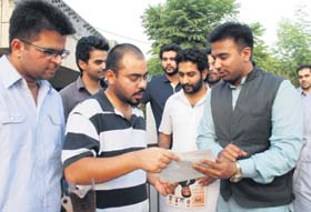 Cong candidate Chaitanya Rai Vashishth during an election campaign in Ward 9, Panchkula