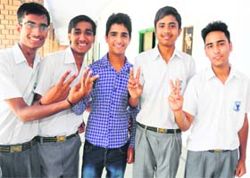 Students belonging to the economically weaker section who performed well in the CBSE Class X exams at St John’s High School