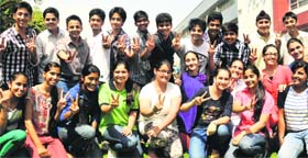 Students of Manav Mangal School in a jubilant mood after the declaration of the CBSE Class X results in Mohali on Thursday