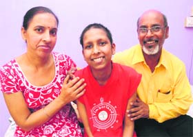 Ashutosh Kaushal, a cancer patient, in a jubilant mood with his parents at their residence in the Railway Colony
