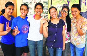 Sportspersons from Sacred Heart School who performed well in the CBSE Class X exams strike a pose at the school in Sector 26, Chandigarh, on Thursday