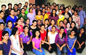 Students of Bhavan Vidyalaya, Sector 15, pose for a picture with their teachers after their school stood second in the tricity in the CBSE Class X exams in Panchkula on Thursday