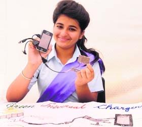 Nidhi Sharma with the mobile charger