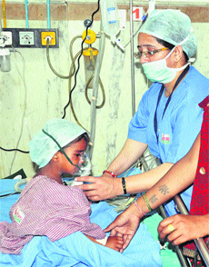 Tannu undergoes treatment at a private hospital in Palwal on Thursday.
