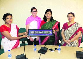 Director of the Department of Fashion Technology of St Catherine University of Minopolies, USA, Anupama Pasricha (left) presents a memento to the Vice-Chancellor, Dr Pankaj Mittal, while leaving the university after a two-day visit