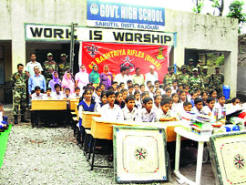 Rashtriya Rifles Battalion distributes stationery and sports items at a school in Jammu on Wednesday
