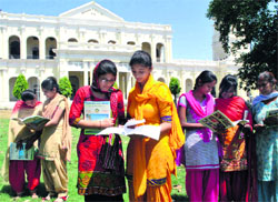 Admission time: Students go through application forms at Government Mohindra College in Patiala on Friday. Tribune photo: Rajesh Sachar