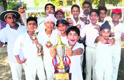 Members of the St Kabir cricket team in a jubilant mood after winning the 2nd Brother McCann U-14 Cricket Tournament at St Johns School in Sector 26, Chandigarh, on Friday. Tribune Photo: Parvesh chauhan