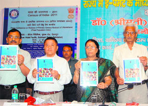 Uttarakhand Finance and Census Minister Indira Hridayesh releases the Census Report of 2011 at a function in Dehradun on Friday.