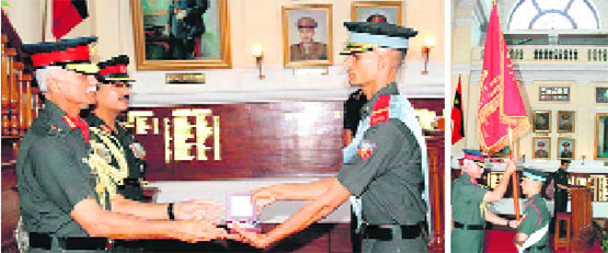 Lt Gen Manvendra Singh, Commandant, IMA, presents an award to a graduate at Army Cadet College in Dehradun on Friday; and (right) he presents Commandants Banner to the Nubra company.