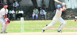 A batsman in action during a match in the 31st All-India Uttarakhand Gold Cup Cricket Tournament in Dehradun on Friday. Tribune photo: Vinod Pundir 