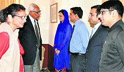 Governor NN Vohra and his wife Usha Vohra interact with a group of IAS entrants at Raj Bhawan in Srinagar on Friday