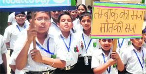Schoolchildren during a rally on the occasion of World No Tobacco Day in Patiala on Friday. 