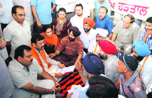 BJP state chief Kamal Sharma meets members of Guru Nanak Dev University Teachers Association in Amritsar on Saturday. 