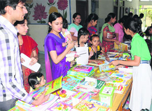 Visitors at a book exhibition at RBDAV school in Paras Ram Nagar in Bathinda on Saturday. 