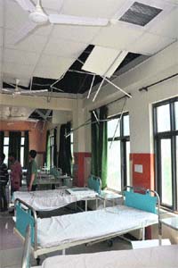 A view of the damaged roof of a hospital room following the recent earthquake in Bhaderwah