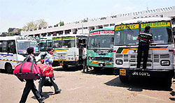 SRTC buses wait for passengers at the BC Road bus stand in Jammu on Saturday