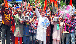 Activists of Shiv Sena Dogra Front protest against the Power Development Department in Jammu on Saturday