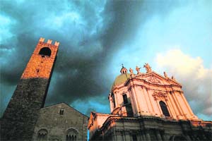 The Cathedral of Brescia is seen at sunset in downtown Brescia. Situated at the foot of the Alps, Brescia is a city in northern Italy It is the second largest city in Lombardy, after the capital, Milan