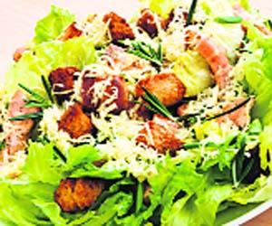 Caesar salad gets its crunchiness from croutons. Parmesan cheese and eggs add to the flavour