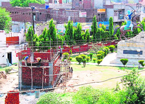 Construction work of a structure underway at the Jassa Singh Ramgarhia Memorial Park in Amritsar on Sunday. 