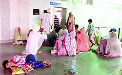 Applicants await their turn to get their UID cards prepared at the District Administrative Complex in Muktsar