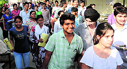 Candidates coming out of the RBDAV Senior Secondary Public School, an examination centre, after taking their JEE (Advanced) exam, in Bathinda on Sunday