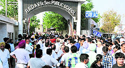 Parents waiting outside the examination centre