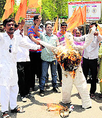 Activists of Shiv Sena (Hindustan) burn an effigy of the BJP in protest against Operation Blue Star memorial, in Bathinda, on Sunday