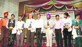 The winners of the Vivekananda Award being honoured at the Liions Bhawan In Jalandhar on Sunday