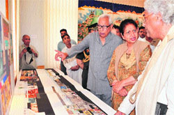 Governor NN Vohra and his wife Usha Vohra visit an art exhibition in Srinagar on Sunday. A Tribune photograph
