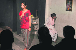 A scene from the English play 30 Days in September enacted at the Natrang Studio Theatre, in Jammu on Sunday.