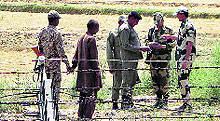 Pakistani national Ghulam Abbaas being handed back to the Pakistan Rangers in the Ferozepur sector on Sunday