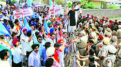 NSUI activists protest outside Education Minister Sikander Singh Malukas house in Kansal village, near Chandigarh, on Sunday