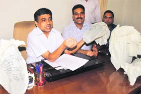 Inspector General of Police Jatinder Jain along with AIG Ajay Maluja addresses a press conference in Bathinda on Monday