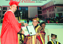 Uttarakhand Governor Dr Aziz Qureshi awards a degree to a student at the first convocation of ICFAI University in Dehradun on Monday.
