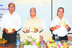 Prof GN Tiwari (centre), the NITK Director, Prof Anand Mohan (right), and the HoD, Mechanical Department, Prof Sudhir Kumar (left) release a CD of the conference proceedings. Photo: DR Vij
