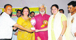 Dr Anil Gaur, Neelam Agarwal and Rahul Dev honour Dr Dhwani Sharma at Bhiwani. A Tribune photograph