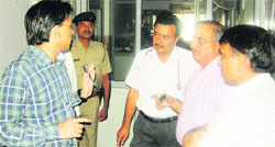 Deputy Commissioner Ashok Kumar Meena (left) with doctors during his visit to the General Hospital at Bhiwani. A Tribune photograph 