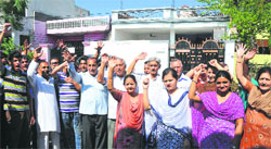 Residents of Shastri Nagar protest in Jammu on Monday. Tribune photo: Inderjeet Singh