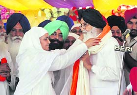 Bholath MLA Bidi Jagir Kaur honours Punjab CM Parkash Singh Badal at the 63rd anniversary of Baba Prem Murarewale in Begowal on Monday