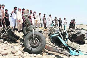 A vehicle after it was hit by a roadside bomb in Laghman province on Monday