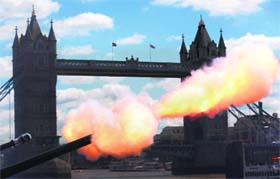 Members of British Army's Honourable Artillery Company perform a 62-round Royal Salute from Gun Wharf at the Tower of London in the honour of the 60th anniversary of the coronation of Britain's Queen Elizabeth II on Monday