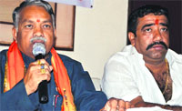 Uttarakhand in charge of the Shiv Sena Chandrakant Khare addresses mediapersons in Dehradun on Tuesday.